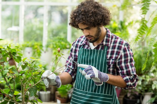 Team member preparing tools before starting garden maintenance